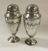 A pair of George III silver peppers. London 1807.