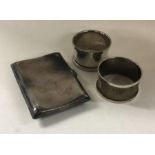 Two plain silver napkin rings etc. Approx. 65 gram