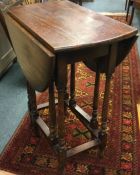 An oak drop leaf table.