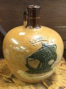 An old pottery whisky bottle.