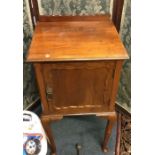 A small mahogany pot cupboard.