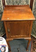 A small mahogany pot cupboard.