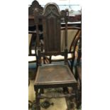 A Georgian oak hall chair.