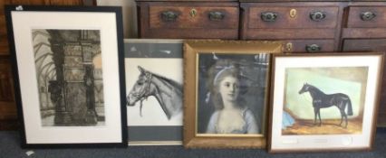 A group of four framed and glazed prints.