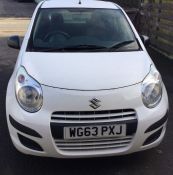 A Suzuki Alto Manual hatchback car in white. PETRO