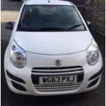 A Suzuki Alto Manual hatchback car in white. PETRO