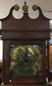 A good oak cased grandfather clock with brass dial