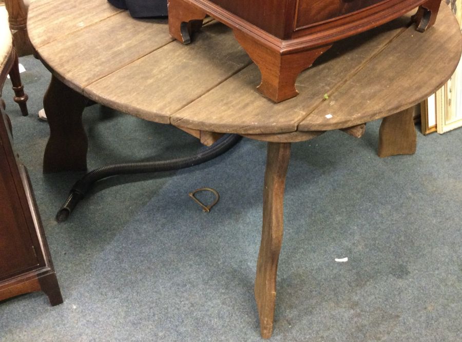 A large rustic garden table.