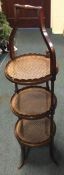 An oak and cane cake stand.