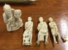 A group of Antique carved ivory figures.