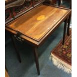 An Antique mahogany butler's tray on stand.