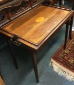 An Antique mahogany butler's tray on stand.