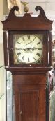 An oak cased grandfather clock with painted dial.