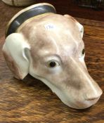 A good Antique cup in the form of a greyhound.