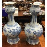 A pair of blue and white Delft vases.