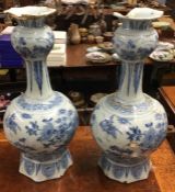 A pair of blue and white Delft vases.