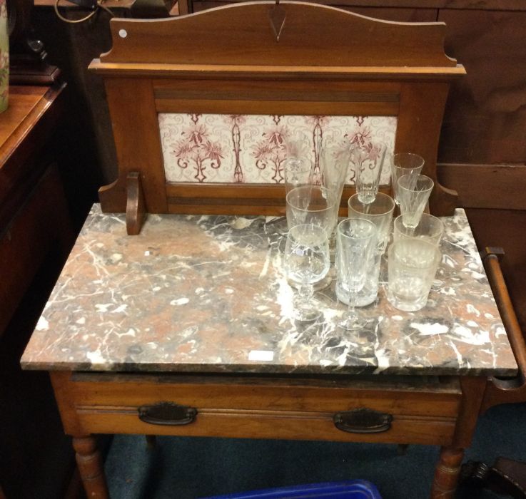 A marble top wash stand.