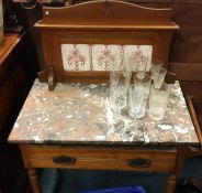 A marble top wash stand.