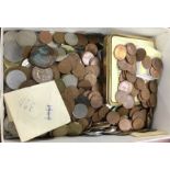 A box containing copper and old coinage.