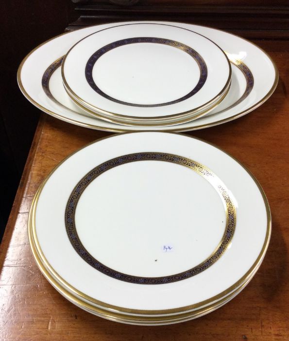 A set of Minton plates with gilded decoration.