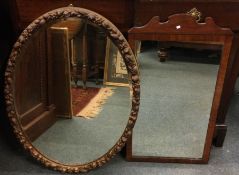 An Antique mahogany framed mirror together with on