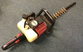 An old Mountfield petrol hedge trimmer.