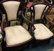 A pair of late Victorian chairs.