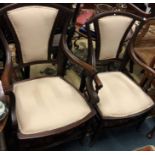 A pair of late Victorian chairs.