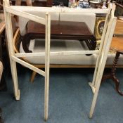 A large vintage folding drying rack.