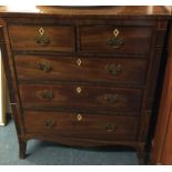 A small mahogany chest of five drawers with ivory