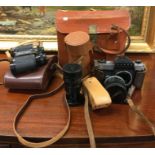 An old Canon camera, binoculars etc.