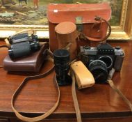 An old Canon camera, binoculars etc.