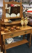 A satinwood single drawer dressing chest.