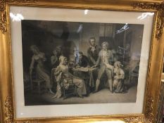 A large gilt framed engraving.