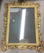 A gilt framed dressing table mirror.