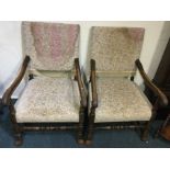 A pair of oak upholstered chairs.