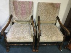 A pair of oak upholstered chairs.