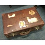 A large leather suitcase.