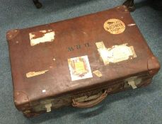 A large leather suitcase.