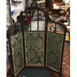 A French carved threefold screen.