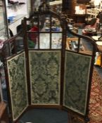 A French carved threefold screen.