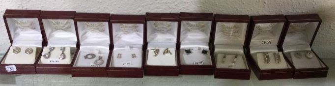 Eight pairs of silver earrings. Est. £20 - £30.