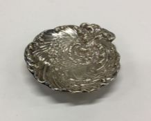 A chased American silver butter dish. Marked Gorha