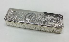 A large chased Victorian silver snuff box depictin