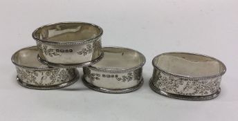 An attractive set of four oval silver engraved nap