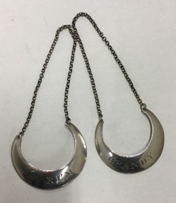 A good pair of crescent shaped Georgian silver win