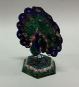 A silver and enamel figure of a bird. Approx. 54 g