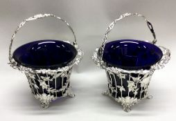 An attractive pair of Victorian silver baskets dec