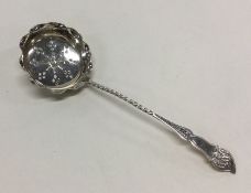 A small silver engraved sifter spoon. Birmingham.