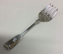 A large Victorian silver meat serving fork. London